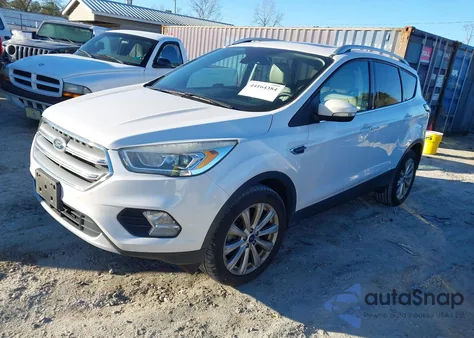 2017 Ford Escape Titanium z USA, uszkodzony, nr VIN 1FMCU0J94HUD64422